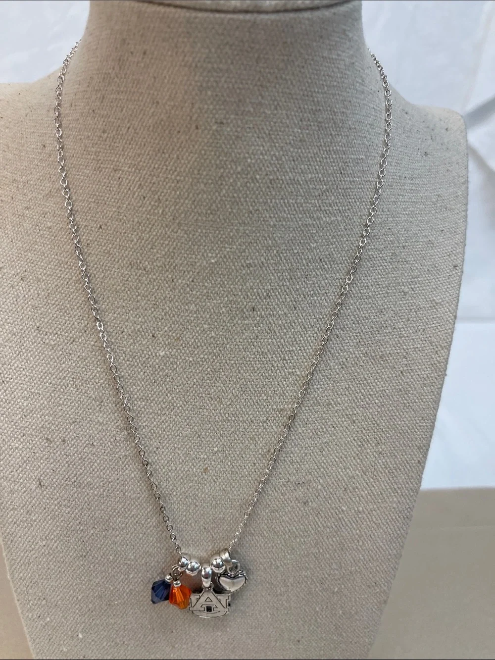 Auburn collegiate silver necklace with AU pendant in blue and orange